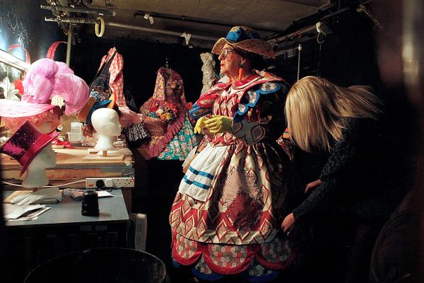Pantomime Dame Kenneth Alan Taylor and his dresser Dani Kidson fuss with finishing touches backstage at a panto performance of "Jack and The Beanstalk" at Nottingham Playhouse in 2013.